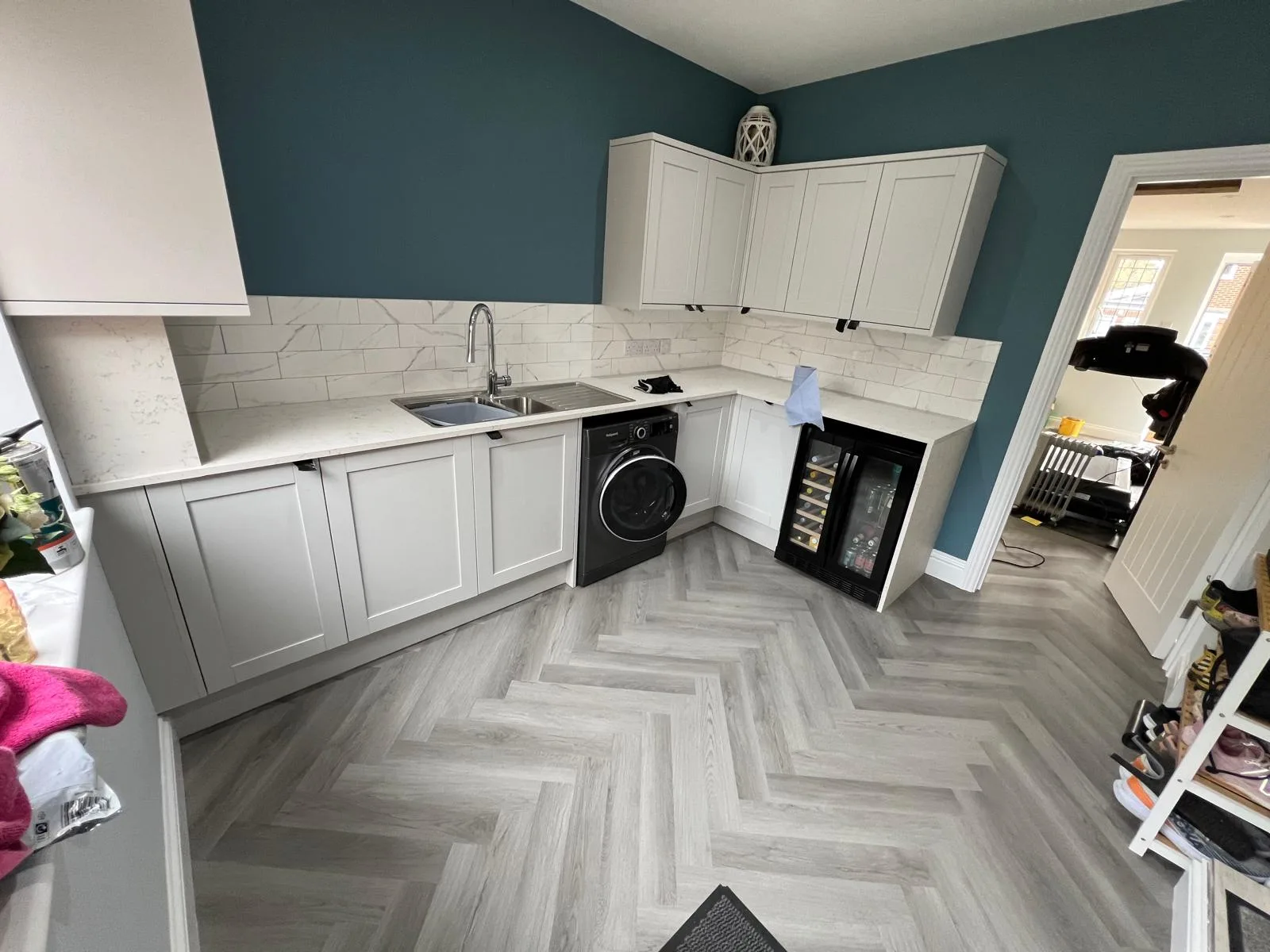 Finished LVT flooring installation in a fitted kitchen